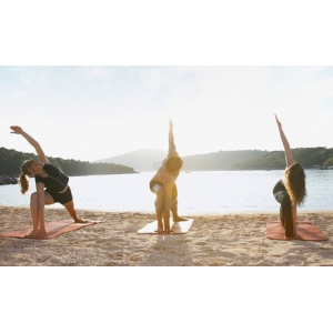 Up to 75% Off  10 Beach Yoga Classes or an Unlimited Season Pass at Sun & Moon Yoga